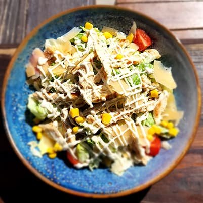 Caesar Salad with chicken fillet and grana cheese