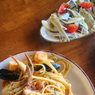 Fish menu: grilled shrimp, seafood risotto and grilled salmon